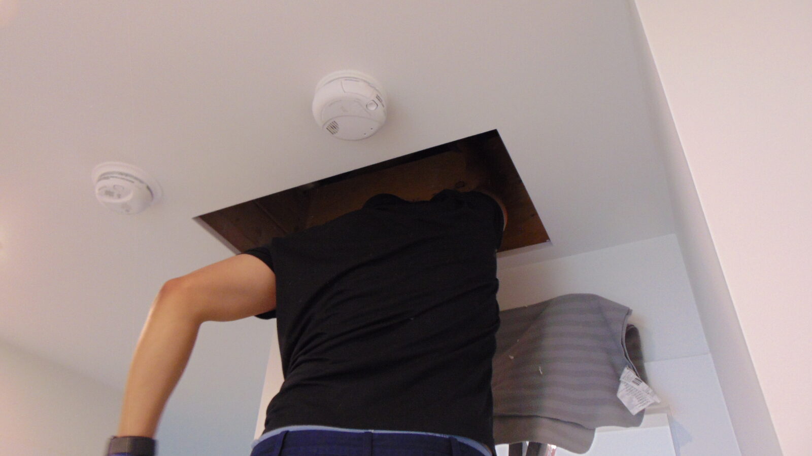 Inspecting attic access and smoke detectors